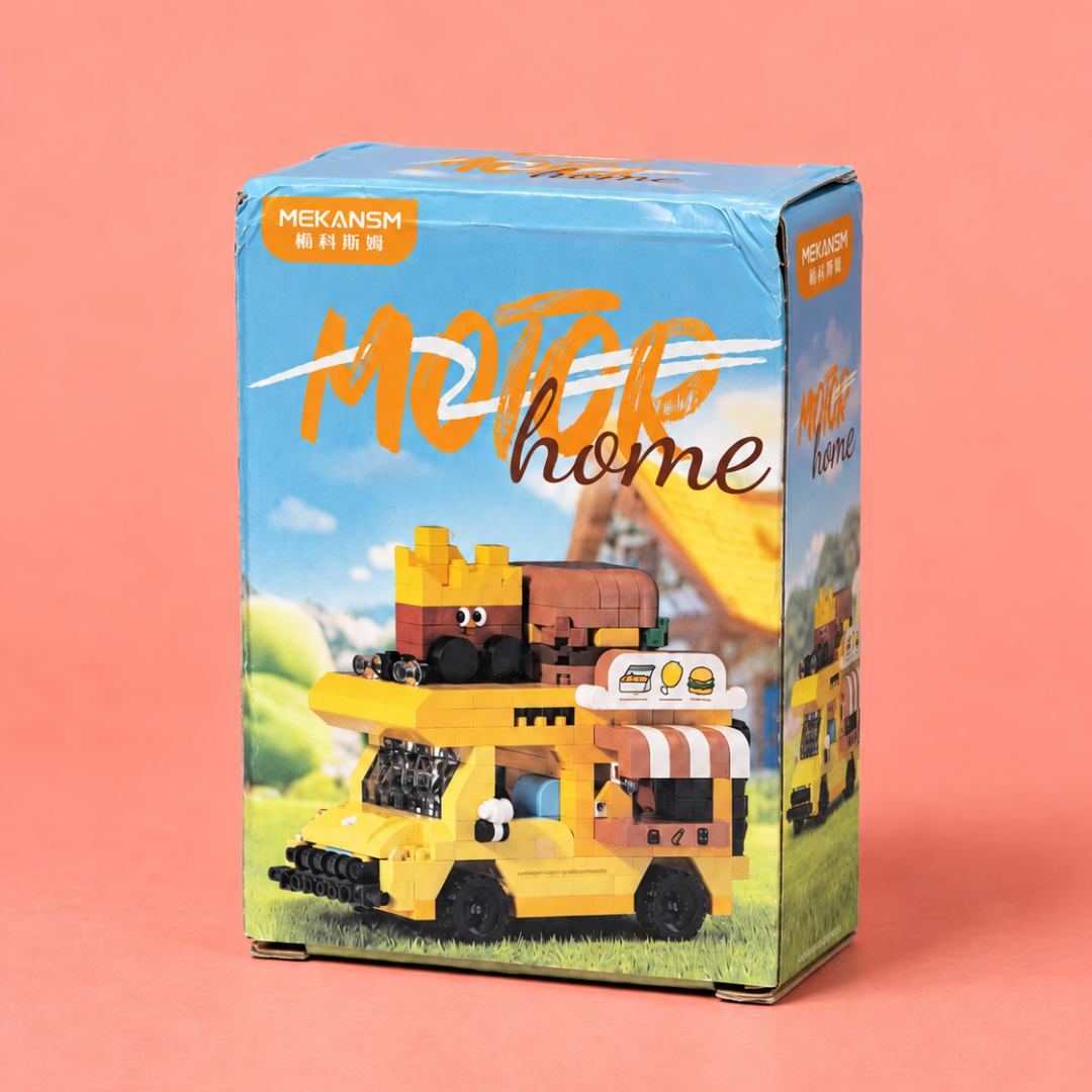 Front view of MEKANSM yellow food truck building blocks box